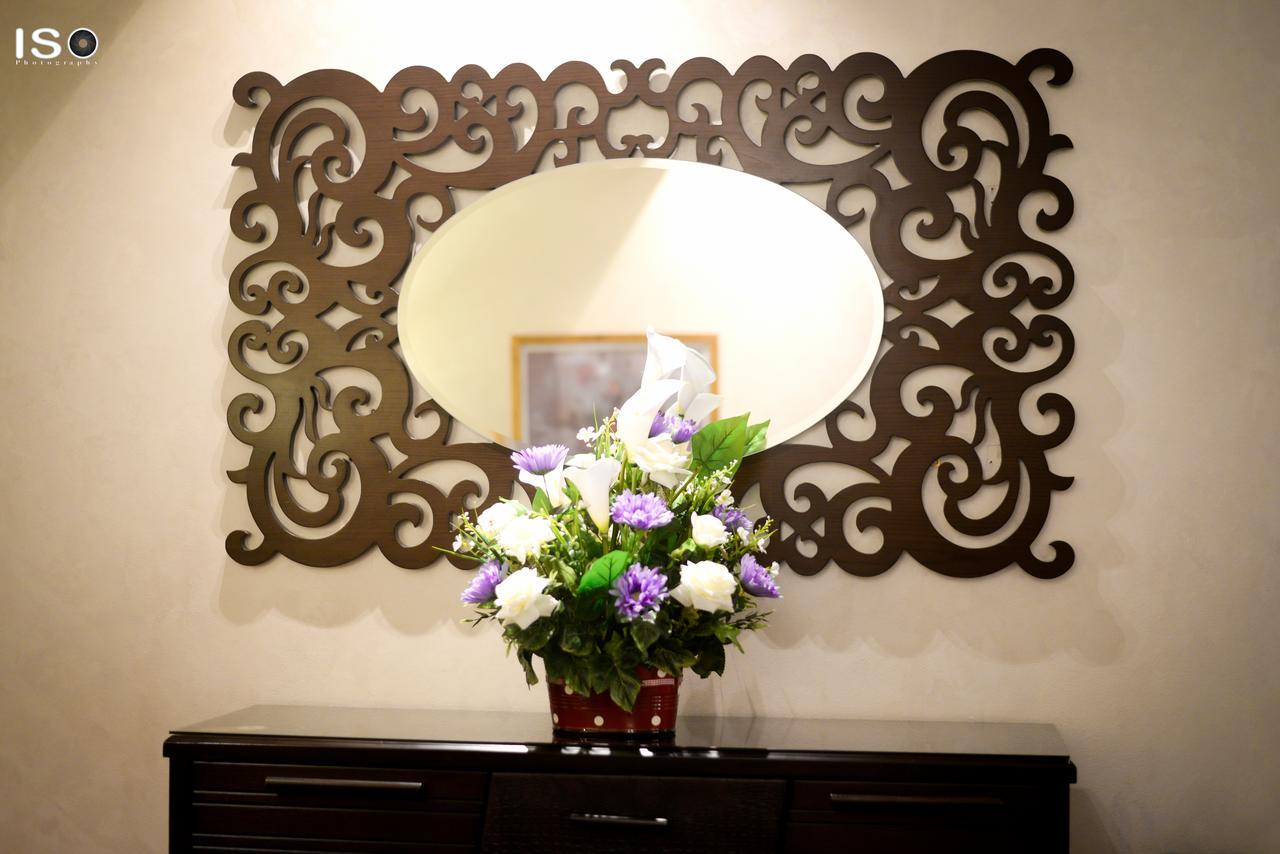 Hotel Tolip El Narges Kairo Exterior foto Laser cut mirror frame